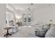 Cozy Gathering room featuring French doors opening to a pool and patio at 750 Pond Lily Way, Venice, FL 34293