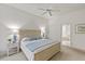 Spacious main bedroom with ensuite bathroom access at 750 Pond Lily Way, Venice, FL 34293