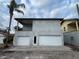 Modern two-story home with attached two-car garage and partial landscaping at 820 46Th N Ave, St Petersburg, FL 33703