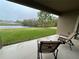 Relaxing covered patio with pond and conservation views at 11854 Thicket Wood Dr, Riverview, FL 33579