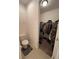 Toilet and walk in closet at 11854 Thicket Wood Dr, Riverview, FL 33579