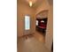 Bright entryway with tile flooring and view of game room at 11854 Thicket Wood Dr, Riverview, FL 33579