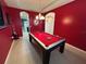 Game room featuring a pool table and team logos at 11854 Thicket Wood Dr, Riverview, FL 33579