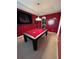 Game room with pool table, Alabama and Clemson decor at 11854 Thicket Wood Dr, Riverview, FL 33579