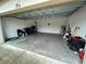 Clean and spacious two-car garage with open door at 11854 Thicket Wood Dr, Riverview, FL 33579