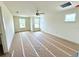 Spacious bedroom with new flooring and large windows at 13998 Emerald Fields Dr, Hudson, FL 34667