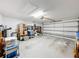 Spacious garage with ample storage shelving and space for two vehicles at 1718 S Pebble Beach Blvd, Sun City Center, FL 33573