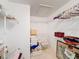 Large walk-in closet with ample shelving and hanging space at 1718 S Pebble Beach Blvd, Sun City Center, FL 33573