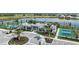 Aerial view of community amenities including pool and pickleball courts at 18040 Cherished Loop, Bradenton, FL 34211