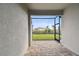 Covered patio with brick pavers and a view of the backyard at 18040 Cherished Loop, Bradenton, FL 34211