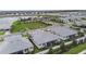 Community overview featuring lake and various houses at 18178 Cherished Loop, Bradenton, FL 34211