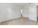 Bright bedroom with wood-look floors and access to bathroom at 18178 Cherished Loop, Bradenton, FL 34211