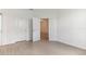 Spacious bedroom with wood-look tile flooring and ample closet space at 18178 Cherished Loop, Bradenton, FL 34211