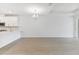 Bright dining room with tile floors and modern chandelier at 18178 Cherished Loop, Bradenton, FL 34211