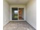 Sliding glass door leads to backyard patio with view of kitchen at 18178 Cherished Loop, Bradenton, FL 34211