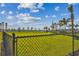 Expansive fenced dog park with lush green grass at 1885 Bilge Ln, Sarasota, FL 34240