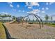 playground with swings and climbing structures at 1885 Bilge Ln, Sarasota, FL 34240