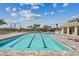 Resort-style pool with plenty of lounge chairs for sunbathing at 1885 Bilge Ln, Sarasota, FL 34240