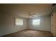 Bright bedroom with carpet, ceiling fan, and window at 2275 Pine View Cir, Sarasota, FL 34231