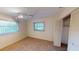 Spacious bedroom featuring a ceiling fan and large closet at 2275 Pine View Cir, Sarasota, FL 34231