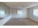 Bedroom with mirrored wall and large windows, offering natural light at 2275 Pine View Cir, Sarasota, FL 34231