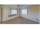 Spacious bedroom with large window and mirrored wall at 2275 Pine View Cir, Sarasota, FL 34231