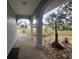 Inviting front porch with walkway and landscaping at 2275 Pine View Cir, Sarasota, FL 34231