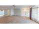 Bright and airy living room with access to kitchen and entryway at 2275 Pine View Cir, Sarasota, FL 34231