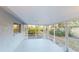 Spacious screened porch overlooking the backyard at 2275 Pine View Cir, Sarasota, FL 34231