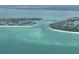 Aerial view of a coastal inlet and bridge at 3060 Grand Bay Blvd # 174, Longboat Key, FL 34228