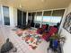 Relaxing balcony with patio furniture and ocean view at 3060 Grand Bay Blvd # 174, Longboat Key, FL 34228