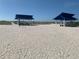 Beach access with shaded picnic areas at 3060 Grand Bay Blvd # 174, Longboat Key, FL 34228