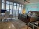 Spacious bedroom with water view and built-in workspace at 3060 Grand Bay Blvd # 174, Longboat Key, FL 34228