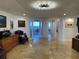 Spacious hallway with tile floors and access to various rooms at 3060 Grand Bay Blvd # 174, Longboat Key, FL 34228