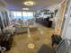 Spacious living room with water view and upscale furnishings at 3060 Grand Bay Blvd # 174, Longboat Key, FL 34228