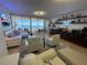 Elegant living room showcasing stunning water views at 3060 Grand Bay Blvd # 174, Longboat Key, FL 34228