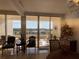 Living room with view of balcony and relaxing ocean scenery at 3060 Grand Bay Blvd # 174, Longboat Key, FL 34228