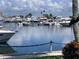 Calm marina with many yachts and boats at 3806 Gulf Of Mexico Dr # C310, Longboat Key, FL 34228