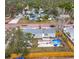 Aerial view showcasing home, deck, pool, and surrounding neighborhood at 5340 5Th S Ave, St Petersburg, FL 33707