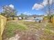 Spacious backyard with a wooden deck and inground pool at 5340 5Th S Ave, St Petersburg, FL 33707