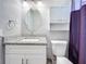 Bathroom with granite vanity and updated fixtures at 5340 5Th S Ave, St Petersburg, FL 33707