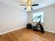 Bright bedroom with hardwood floors and elliptical machine at 5340 5Th S Ave, St Petersburg, FL 33707