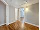 Hallway with hardwood floors leading to bedrooms at 5340 5Th S Ave, St Petersburg, FL 33707