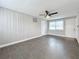 Living room with tile floors and ceiling fan at 5340 5Th S Ave, St Petersburg, FL 33707