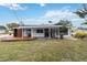 Back exterior view of the house and deck at 6628 Keystone Dr, Sarasota, FL 34231