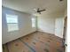 Bright bedroom with new flooring and neutral walls at 7950 Chandler Lake Ct, Hudson, FL 34667