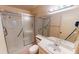 Bathroom with glass shower and a white sink vanity, combining functionality with a clean aesthetic at 1710 Curry Ave # 42, Nokomis, FL 34275