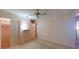 Neutral bedroom with carpeted floors and a closet at 1710 Curry Ave # 42, Nokomis, FL 34275