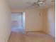 View of bedroom with neutral walls and carpet at 1710 Curry Ave # 42, Nokomis, FL 34275
