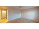 Bright bedroom with adjacent bathroom access at 1710 Curry Ave # 42, Nokomis, FL 34275
